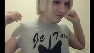 Cute blonde tranny shows off her nice small tits on webcam