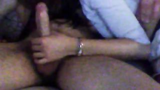 Smiling transsexual is having fun with a pretty long dick