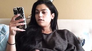 Playful brunette tranny shows off her beautiful naked tits